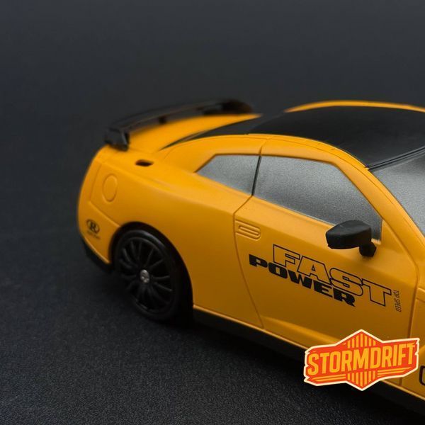 Іграшкова машинка Nissan GT-R жовта для дріфту на радіокеруванні 4WD HB Toys 956 фото
