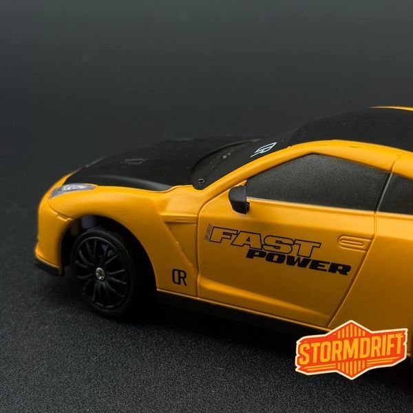 Іграшкова машинка Nissan GT-R жовта для дріфту на радіокеруванні 4WD HB Toys 956 фото