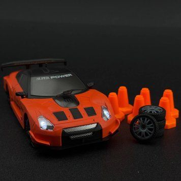 Іграшкова машинка Nissan GT-R помаранчева для дріфту на радіокеруванні 4WD HB Toys 959 фото