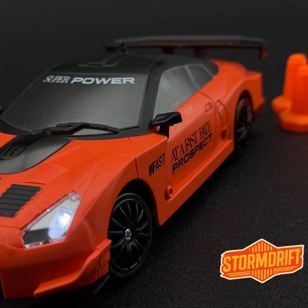 Игрушечная машинка Nissan GT-R оранжевая для дрифта на радиоуправлении 4WD HB Toys 959 фото